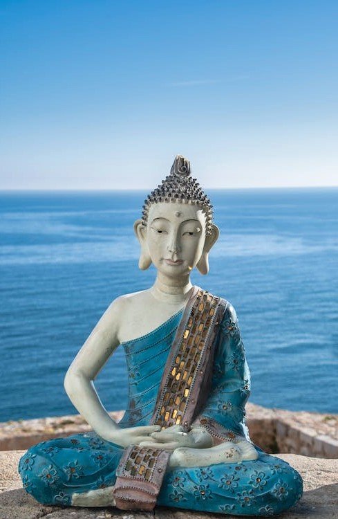 buddha statue against sea wallpaper